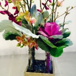 Kale, Orchids and Quince Branches in a Wooden Box with Test Tube Vases